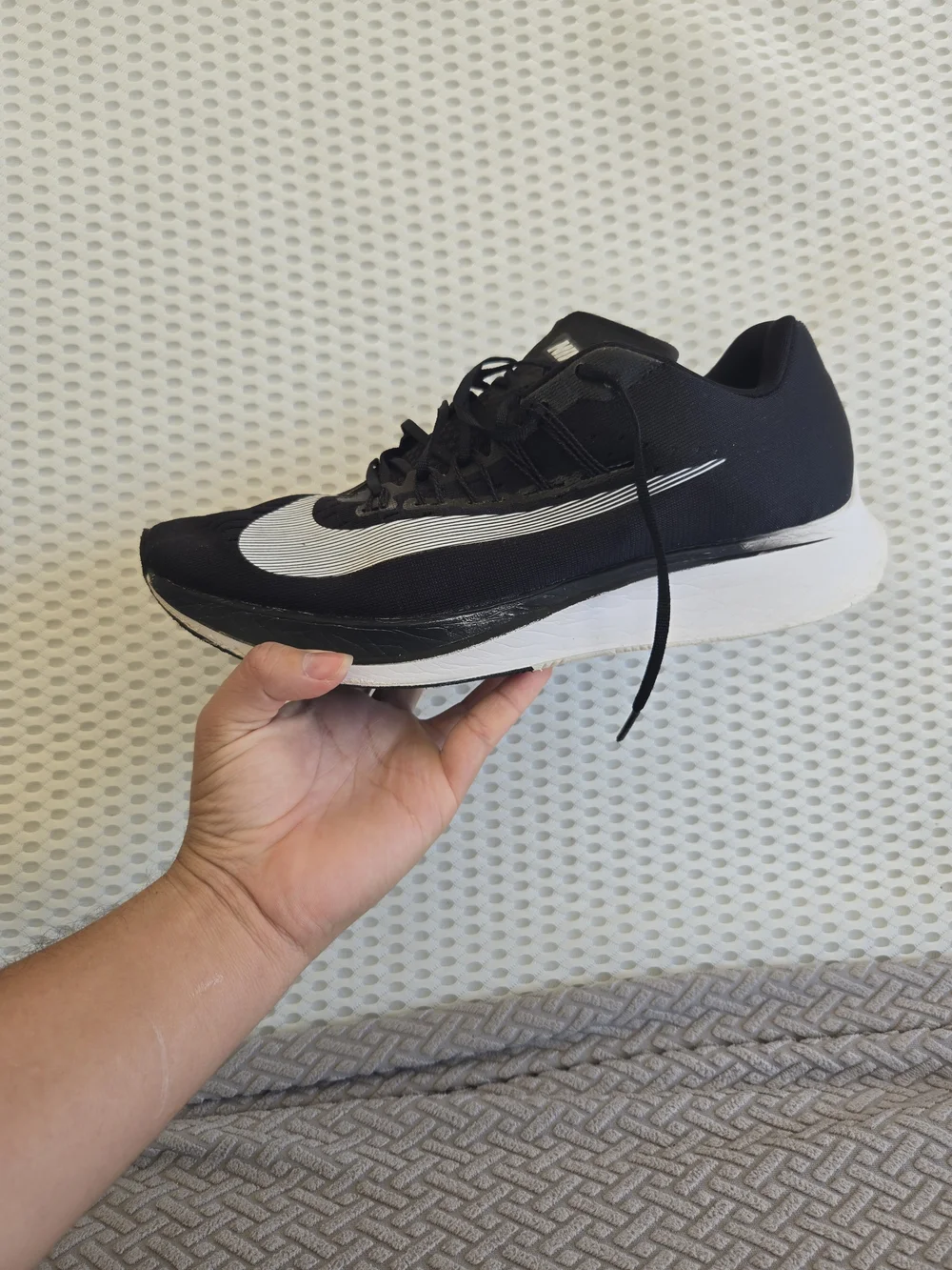 Nike Men’s Black Running Shoes with White Swoosh